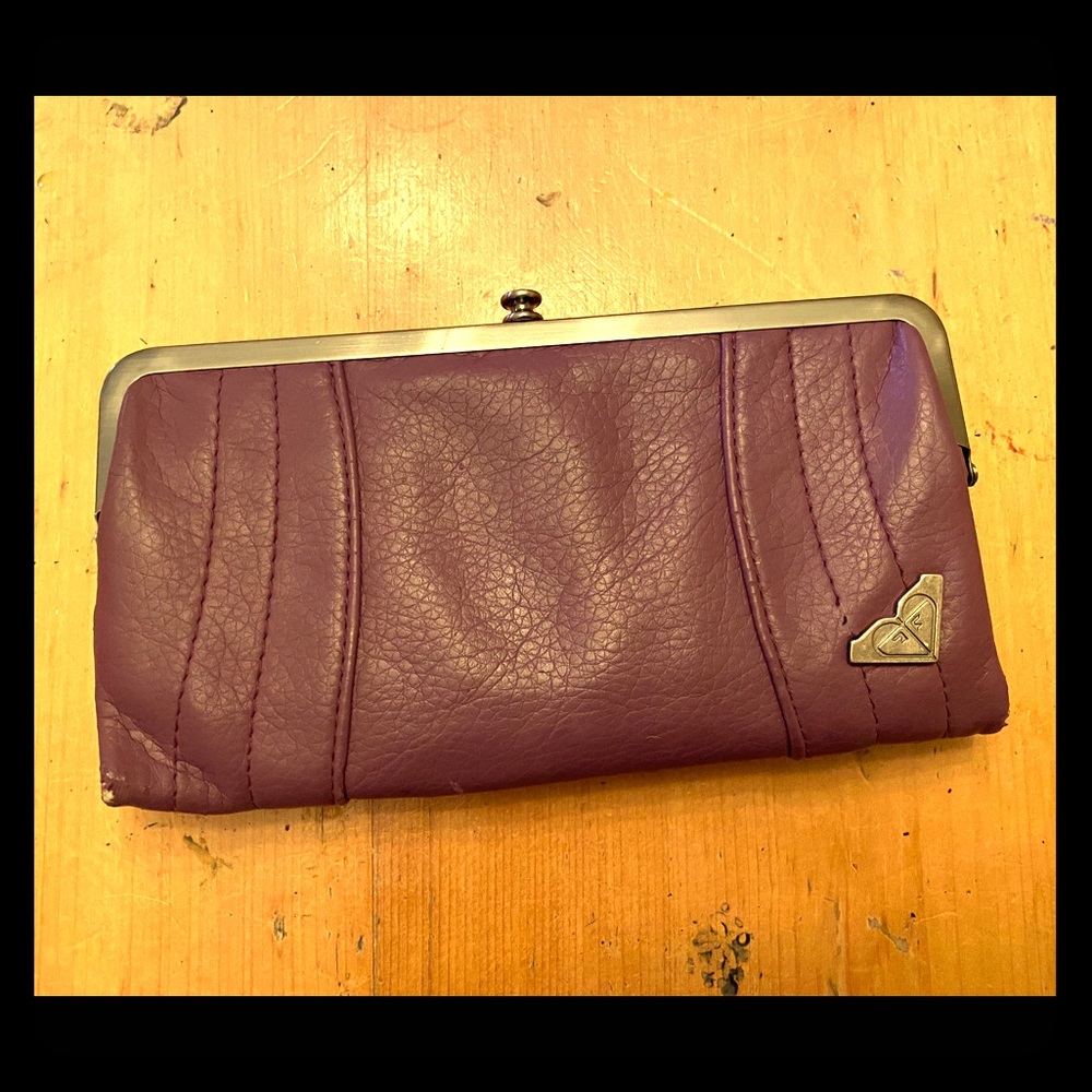 Roxy plum colour, multi pocket wallet.
